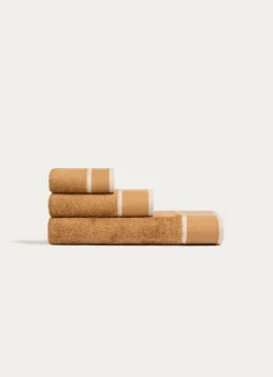 Sale Bouchara SERVIETTE INVITÉ UNIE À LARGE BORDURE ARTHUR CARAMEL